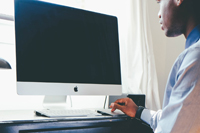 Man using iMac